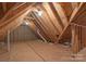 Unfinished attic with visible beams and insulation at 1503 Jack White Dr, Rock Hill, SC 29732