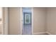 Bedroom features fresh paint, a carpeted floor and a door leading to the exterior of the home at 1503 Jack White Dr, Rock Hill, SC 29732