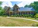 Beautiful brick home with lush landscaping and a welcoming walkway, showing its charming curb appeal at 1503 Jack White Dr, Rock Hill, SC 29732
