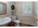Charming powder room features a pedestal sink, toilet, and decorative accents at 1503 Jack White Dr, Rock Hill, SC 29732