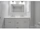Bright bathroom with updated fixtures, double vanity, and modern design at 1538 Hilltop Dr, Shelby, NC 28150