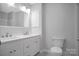 Clean, bright bathroom with double vanity, updated fixtures, and modern design at 1538 Hilltop Dr, Shelby, NC 28150