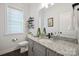 Stylish half bathroom with granite countertops and modern fixtures at 19012 Beecher Commons Dr, Huntersville, NC 28078