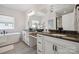 Elegant bathroom with double vanity, soaking tub, and modern finishes at 19012 Beecher Commons Dr, Huntersville, NC 28078