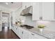 Well-equipped kitchen with stainless steel appliances, stylish tile backsplash, and ample counter space at 19012 Beecher Commons Dr, Huntersville, NC 28078