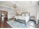 Spacious main bedroom with trey ceiling, sitting area, and ensuite bathroom at 19012 Beecher Commons Dr, Huntersville, NC 28078