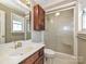 Bathroom includes a vanity with a mirror, toilet, and shower with sliding glass doors at 2912 Peachwood Ct, Fort Mill, SC 29715