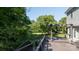 Spacious deck overlooking a well-manicured lawn, mature trees and landscape beds at 2949 Glenstone Dr, Rock Hill, SC 29730