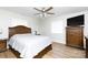 Bedroom with wood floors and ceiling fan, with a view of two matching wood night stands at 2949 Glenstone Dr, Rock Hill, SC 29730