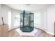 Bedroom with wood floors featuring a birdcage with a blue macaw sitting on top of it at 2949 Glenstone Dr, Rock Hill, SC 29730