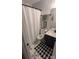 Updated bathroom with patterned tile floor, shower, and modern vanity at 311 Wilkes Place Dr, Fort Mill, SC 29715