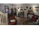 Comfortable dining area with contemporary decor and lots of artwork at 311 Wilkes Place Dr, Fort Mill, SC 29715