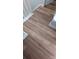 New wood flooring provides a warm look and feel to the living space at 311 Wilkes Place Dr, Fort Mill, SC 29715
