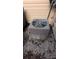 HVAC unit sits on top of gravel and fall leaves at 311 Wilkes Place Dr, Fort Mill, SC 29715