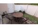 Outdoor patio area with table and chairs, great for entertaining or relaxing at 311 Wilkes Place Dr, Fort Mill, SC 29715