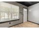 Inviting entryway with a large window, complemented by modern textured wallpaper and sleek flooring at 4520 Buck Skin Ct, Fort Mill, SC 29707