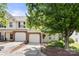 Charming townhome featuring a one car garage and well-maintained landscaping at 4520 Buck Skin Ct, Fort Mill, SC 29707