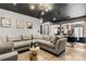 Spacious living room with a comfortable sectional sofa and stylish decor, perfect for relaxing at 4520 Buck Skin Ct, Fort Mill, SC 29707