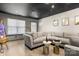 Spacious living room with a comfortable sectional sofa and stylish decor, perfect for relaxing at 4520 Buck Skin Ct, Fort Mill, SC 29707