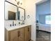 Beautiful bathroom with updated vanity, double sinks, and modern fixtures, adjacent to the bedroom at 4833 Verde View Dr, Gastonia, NC 28056