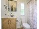 Modern bathroom features an elegant vanity, new fixtures, and bright window at 4833 Verde View Dr, Gastonia, NC 28056