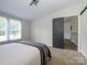 This bedroom features a view of the entryway and plush carpeting at 4833 Verde View Dr, Gastonia, NC 28056