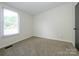A bright bedroom features plush carpeting and natural light at 4833 Verde View Dr, Gastonia, NC 28056