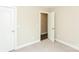 Bright bedroom offering carpet floors, an open doorframe and two storage areas at 671 Sylvan Sw St, Concord, NC 28025