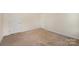 This bedroom features neutral walls, carpet floors, and two entry doors at 7362 Waterwheel Sw St, Concord, NC 28025