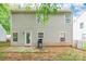 View of backyard with patio, grill, and vinyl fencing at 1274 Winding Path Rd, Clover, SC 29710