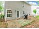 Backyard with patio, grill, and well-maintained lawn at 1274 Winding Path Rd, Clover, SC 29710