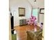Bright bedroom with hardwood floors, large window, and a sofa for seating at 1274 Winding Path Rd, Clover, SC 29710