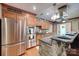 Modern kitchen featuring stainless steel appliances, granite countertops, and custom cabinetry at 1388 Aragon Beach Rd, Rock Hill, SC 29732