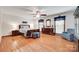 Spacious main bedroom with hardwood floors, ceiling fan, and matching furnishings at 1388 Aragon Beach Rd, Rock Hill, SC 29732