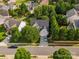 Aerial view of the home highlighting its location, curb appeal, and proximity to street at 13930 Daltrey Ln, Charlotte, NC 28277