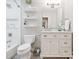 Bathroom featuring a combination tub and shower with white subway tile and modern vanity at 13930 Daltrey Ln, Charlotte, NC 28277