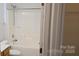 A functional bathroom featuring a shower-tub combo, vanity and standard toilet at 162 Autumn Falls Dr, Lake Wylie, SC 29710