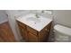 Bathroom featuring a single sink vanity, white countertop, and wood cabinets at 162 Autumn Falls Dr, Lake Wylie, SC 29710
