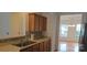 Charming kitchen features a stainless steel sink and lovely view of the dining area at 162 Autumn Falls Dr, Lake Wylie, SC 29710