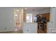 Well-equipped kitchen adjacent to an open-plan dining area and entryway at 162 Autumn Falls Dr, Lake Wylie, SC 29710