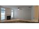The living room has large bright windows and a traditional fireplace at 162 Autumn Falls Dr, Lake Wylie, SC 29710