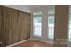 The living room features wood wall accents and large bright windows at 162 Autumn Falls Dr, Lake Wylie, SC 29710