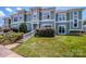 Charming condo with well-maintained lawn, mature shrubs, and stylish architectural details at 17406 Tuscany Ln, Cornelius, NC 28031