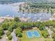 Aerial view of the tennis courts near the docks and lake at 17406 Tuscany Ln, Cornelius, NC 28031