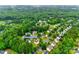 This aerial view shows a neighborhood with lush greenery highlighting the location of 2103 Cantata Ct at 2103 Cantata Ct, Matthews, NC 28105