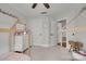 bedroom with unique house-frame beds, white dresser, and neutral walls at 2103 Cantata Ct, Matthews, NC 28105