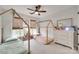 A bedroom features two charming house-frame beds and lots of natural light at 2103 Cantata Ct, Matthews, NC 28105