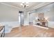 Open-concept living space with hardwood floors, ample seating, and stylish decor at 2103 Cantata Ct, Matthews, NC 28105