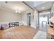 Bright and open living room with hardwood floors and neutral color palette at 2103 Cantata Ct, Matthews, NC 28105