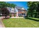 Charming two-story brick home with black shutters and a well-manicured lawn at 2635 Mahogany Ln, Hickory, NC 28602